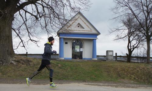 Josefský běh, Zlín, Czech Republic - a 10k runner passes a chapel in the hills above the city  (Copyright © 2016 Hendrik Böttger / runinternational.eu)