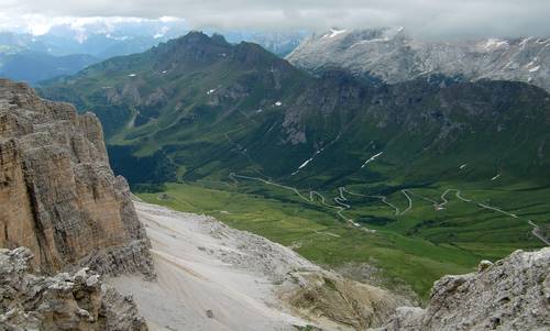 The road to Passo Pordoi, as seen fom the Sella Group, Dolomites, Italy (Copyright © 2011 Hendrik Böttger / runinternational.eu)