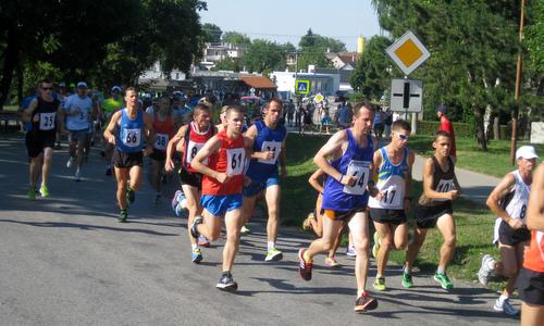 Runners after the start of the 10k road race in Špačince, Slovakia (Copyright © 2015 Marta Országhová)